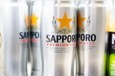 Getty Images Cans of Sapporo Beer, close-up.